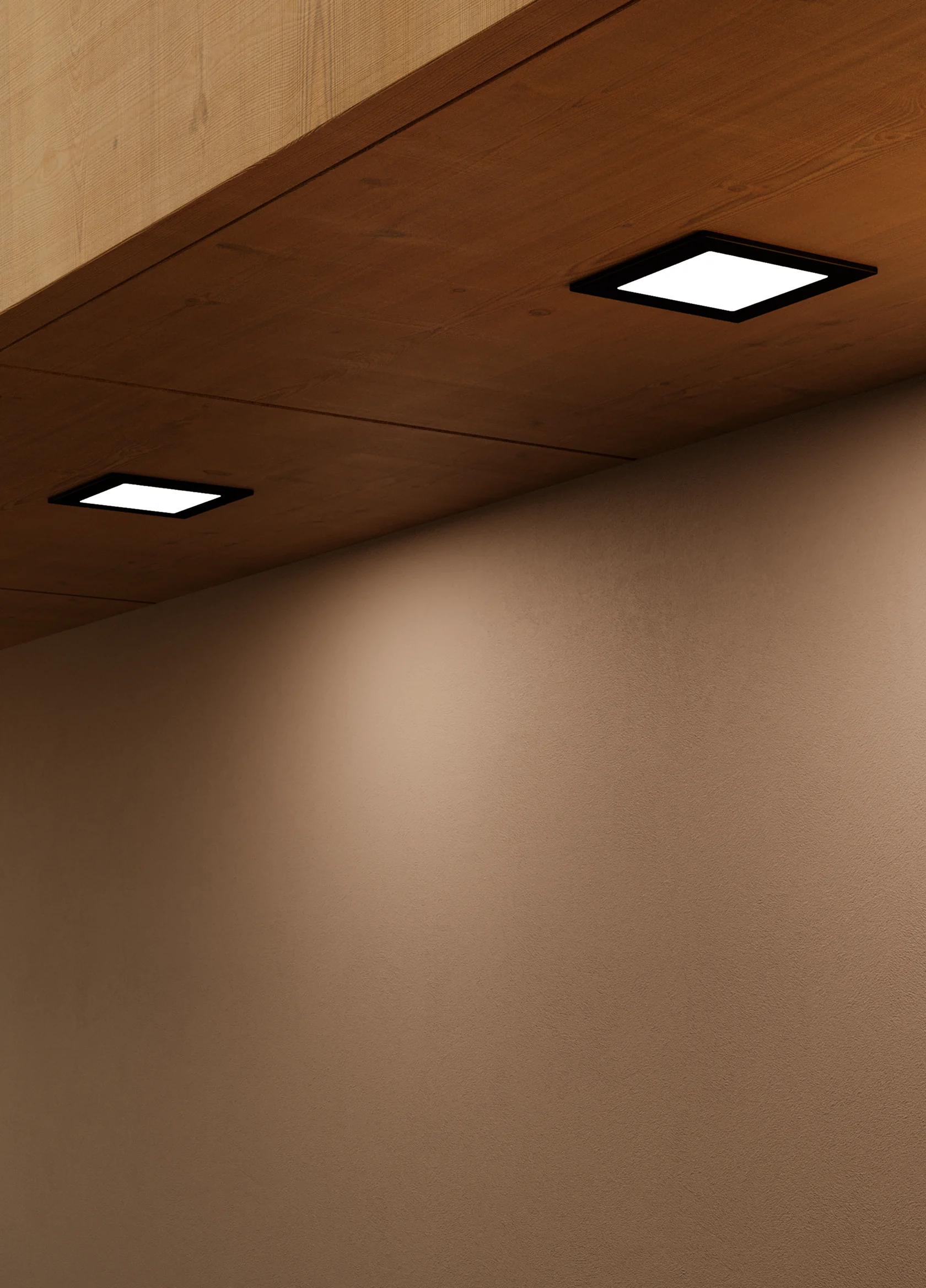 Nahaufnahme einer hölzernen Schrankunterseite mit zwei quadratischen GERA Einbauleuchten, die auf eine beigefarbene Wand darunter leuchten.