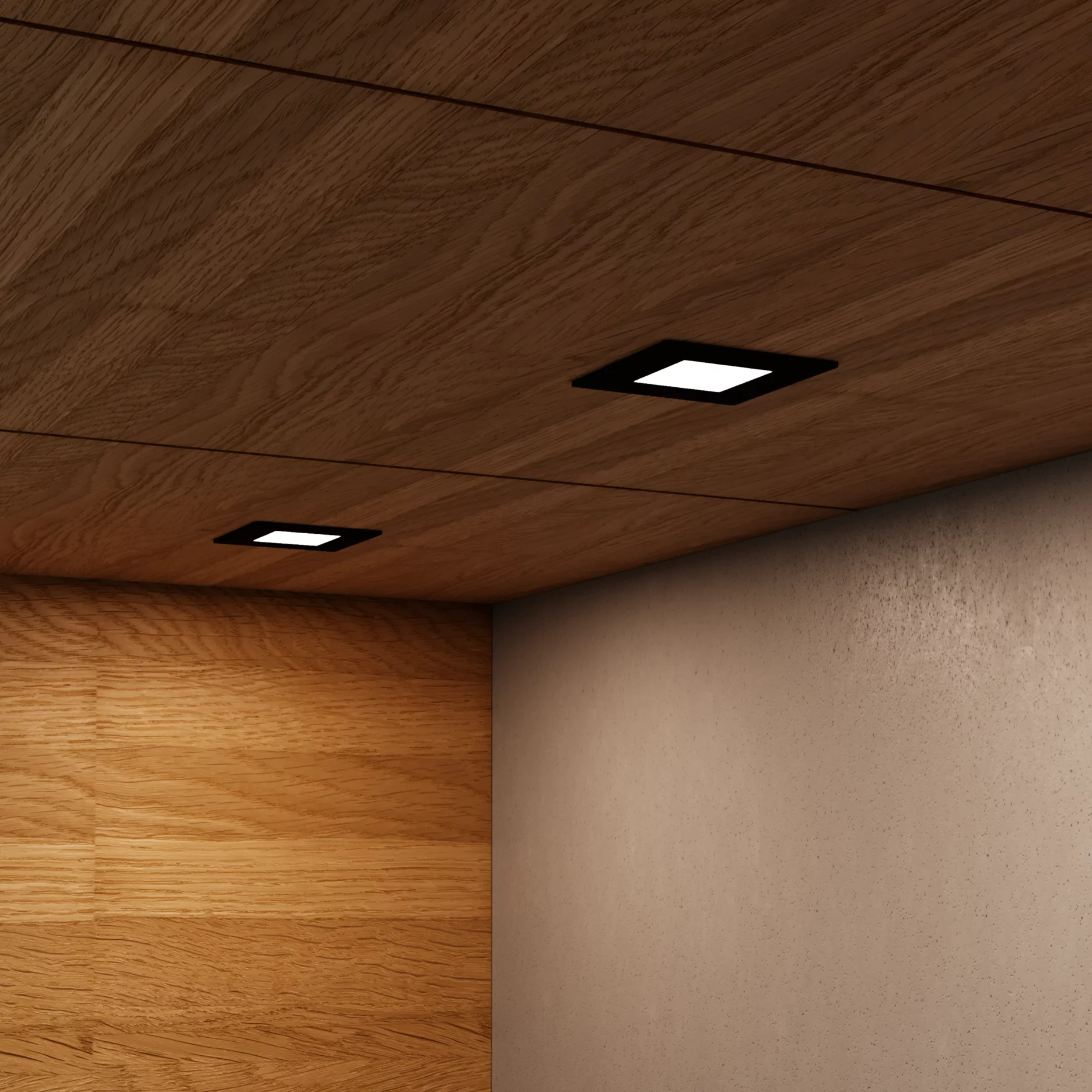 Nahaufnahme einer hölzernen Schrankunterseite mit zwei GERA Einbaustrahlern mit quadratischer Blende, die auf eine beigefarbene Wand darunter leuchten.