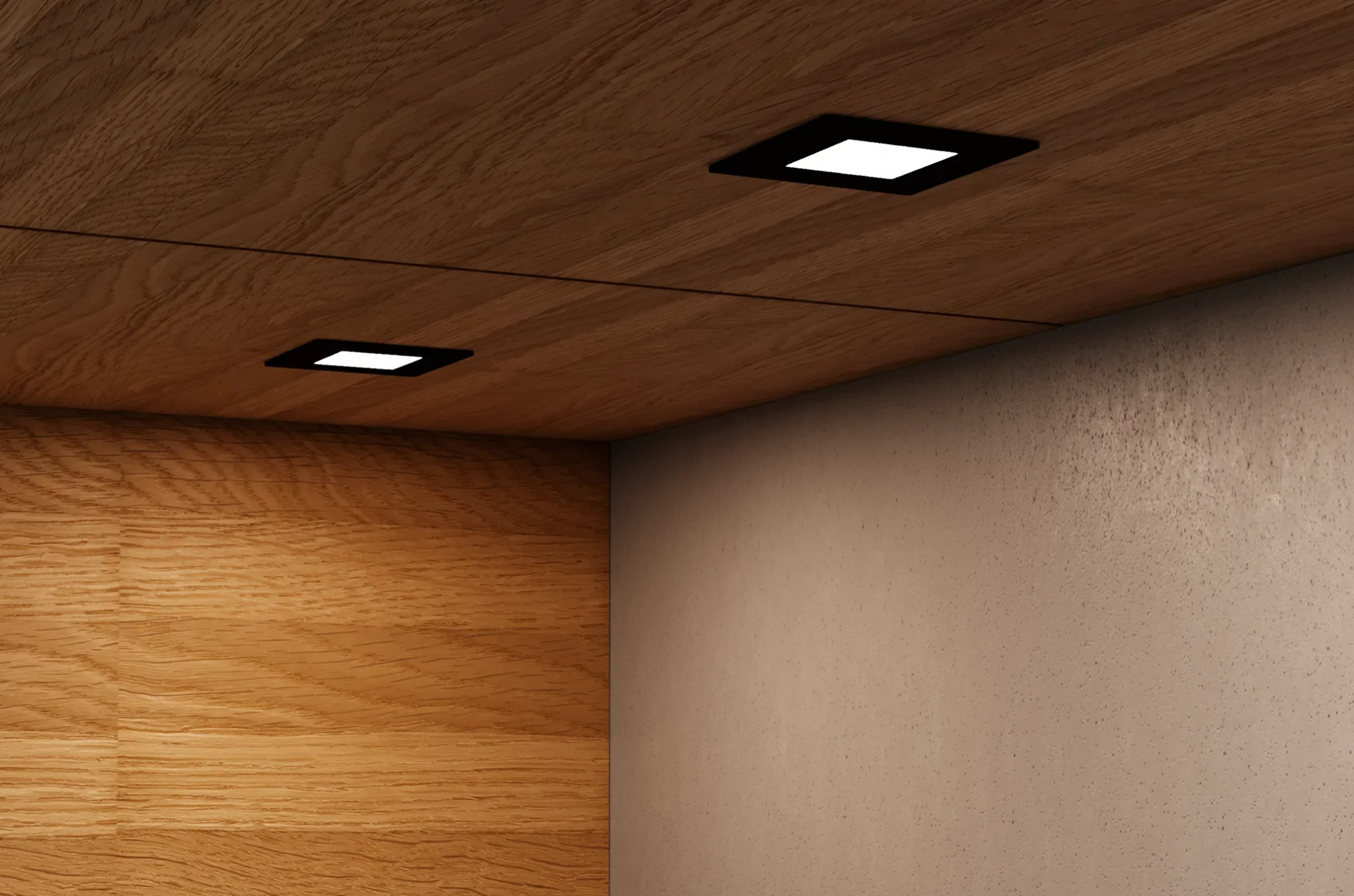 Nahaufnahme einer hölzernen Schrankunterseite mit zwei GERA Einbaustrahlern mit quadratischer Blende, die auf eine beigefarbene Wand darunter leuchten.