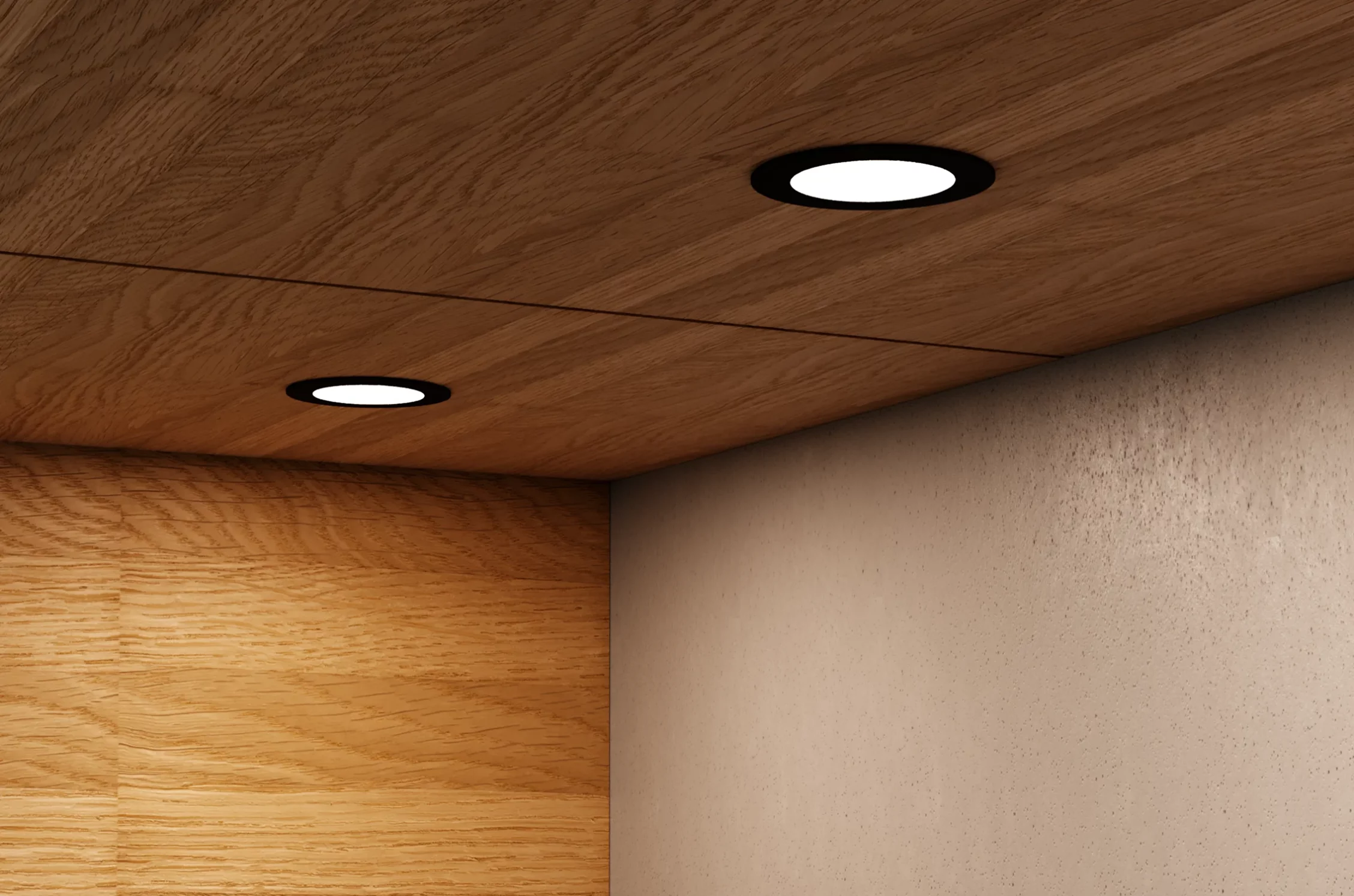 Nahaufnahme einer hölzernen Schrankunterseite mit zwei runden GERA Einbaustrahlern, die auf eine beigefarbene Wand darunter leuchten.