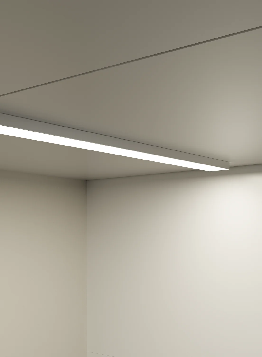 Nahaufnahme der GERA Unterbauleuchte 32×10, montiert unter einem hell lackierten Küchenschrank.